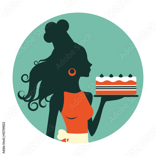 Beautiful baker holding freshly baked cake