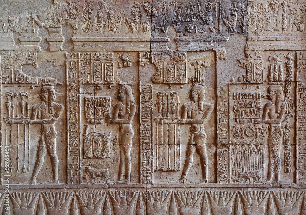Hieroglyphic carvings in ancient egyptian temple Hieroglyphic carvings in ancient egyptian temple