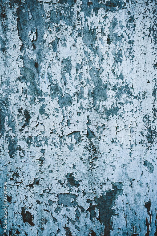 Fototapeta premium Old paint peeling from white door