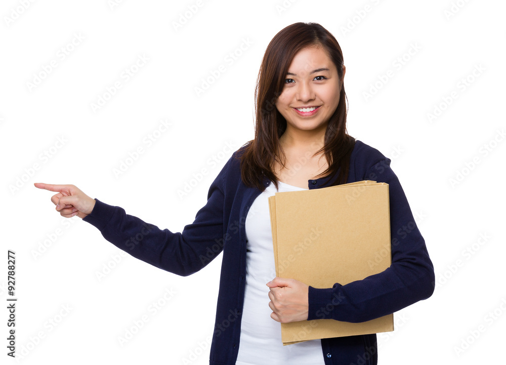 Young woman hold with folder and finger point aside Young woman hold with folder and finger point aside