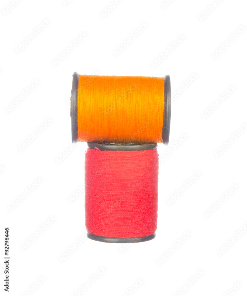 Colourful red and orange thread isolated on white background Colourful red and orange thread isolated on white background