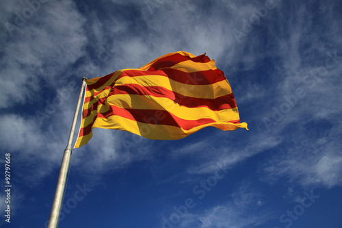 BARCELONA, CATALONIA, SPAIN - AUGUST 31, 2012: Catalan flag fluttering in the wind