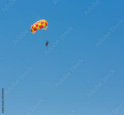 People parasailing over the sea