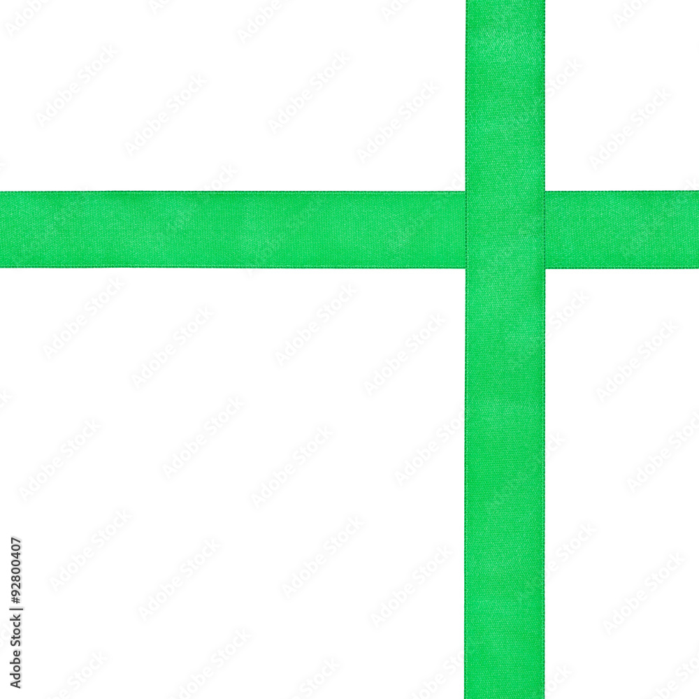 Obraz premium two crossing green satin strips isolated on white