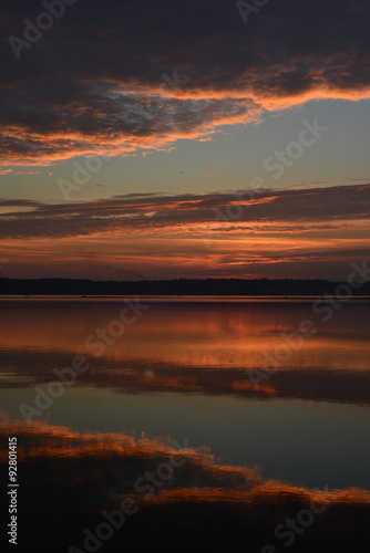 St.Aubin's Bay, Jersey, U.K. A calm still sunset reflected in a pool.