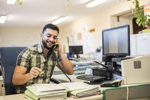 Canvas Print 30s young hipster man style working at office with ambient light