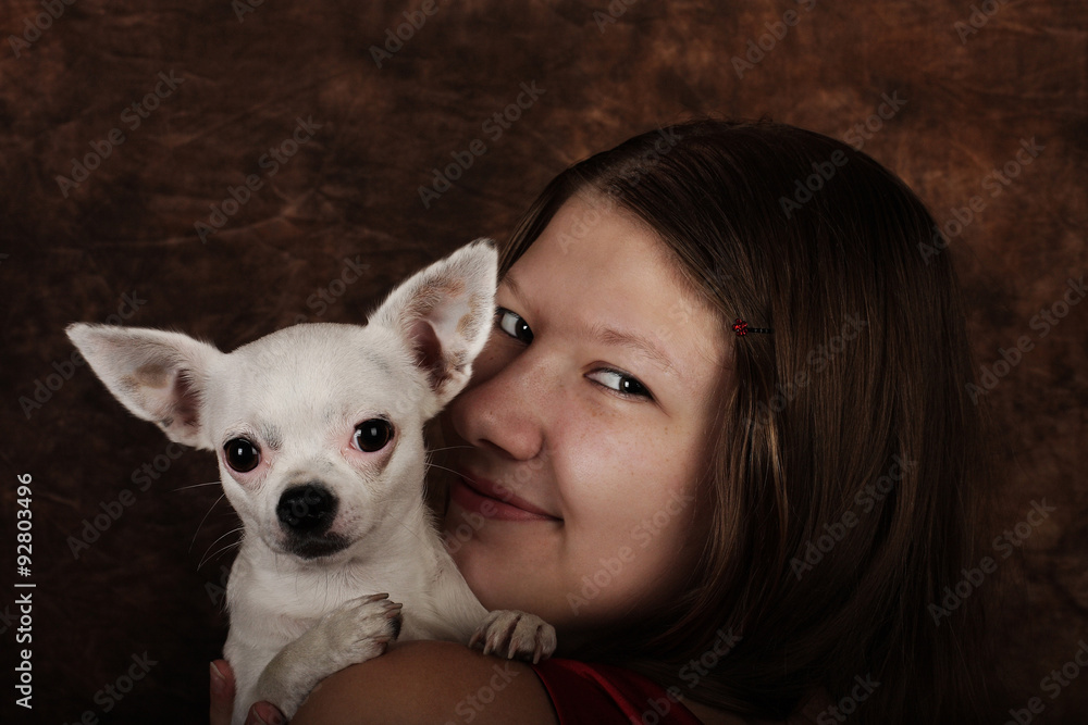 Portrait of young woman with white chihuahua Portrait of young woman with white chihuahua