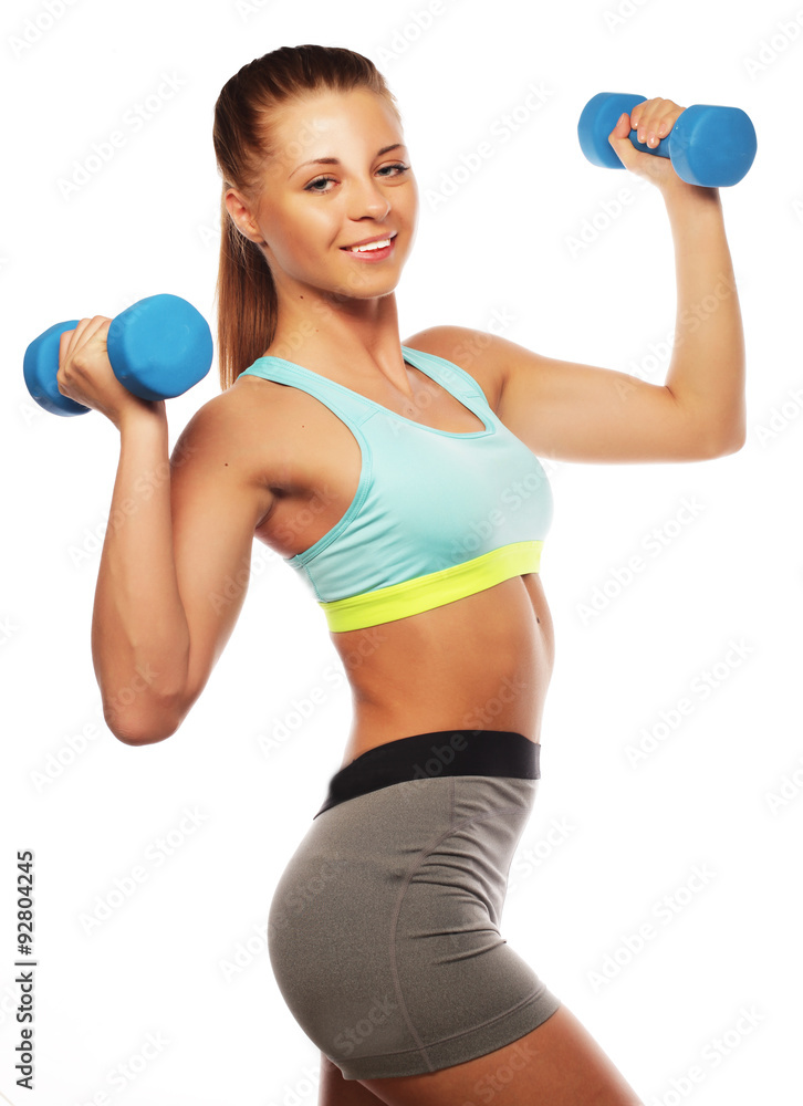 Woman in sport equipment practice with hand weights Woman in sport equipment practice with hand weights