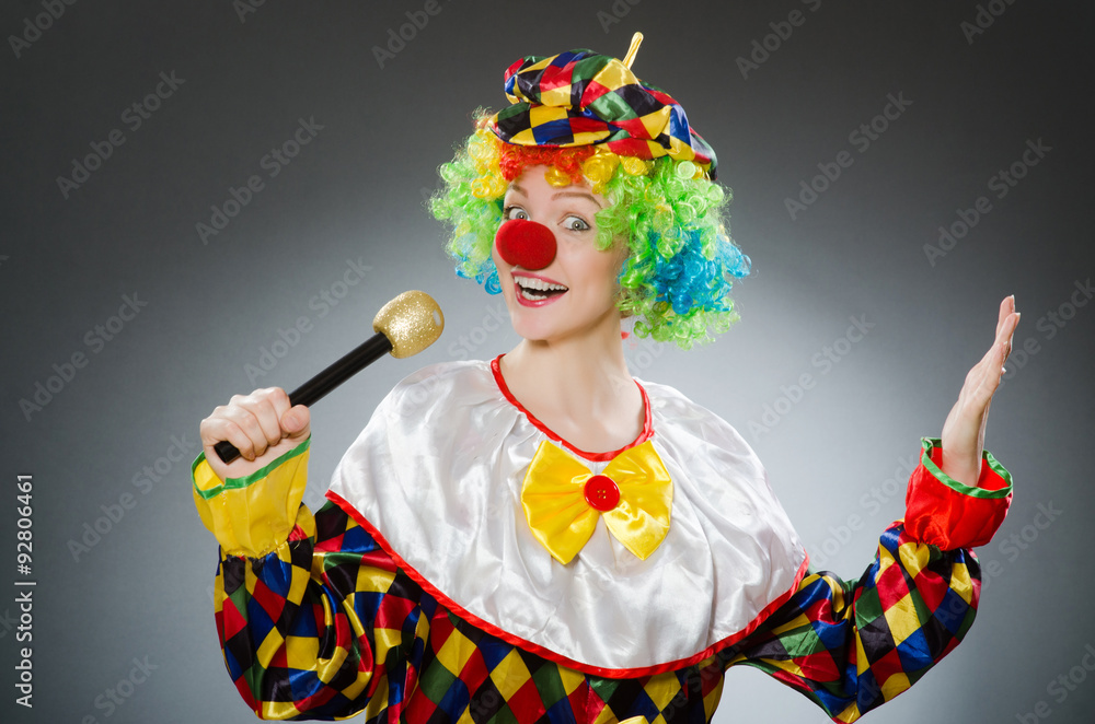 Clown with mic in funny concept Clown with mic in funny concept
