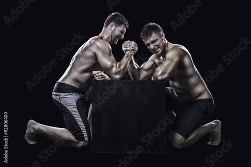 Photography Two athletes arm wrestling