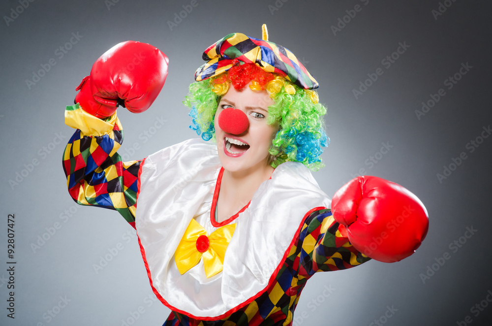 Funny clown with boxing gloves Funny clown with boxing gloves