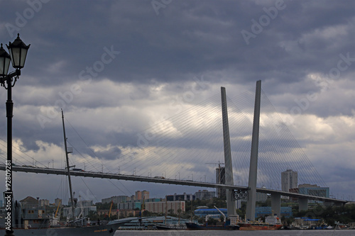 the bridge in Vladivostok, Russia on the background of a stormy sky