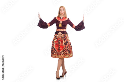 Woman in dress with oriental prints isolated on white