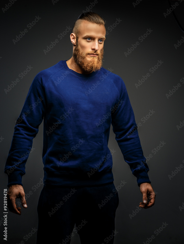  Muscular man with beard.