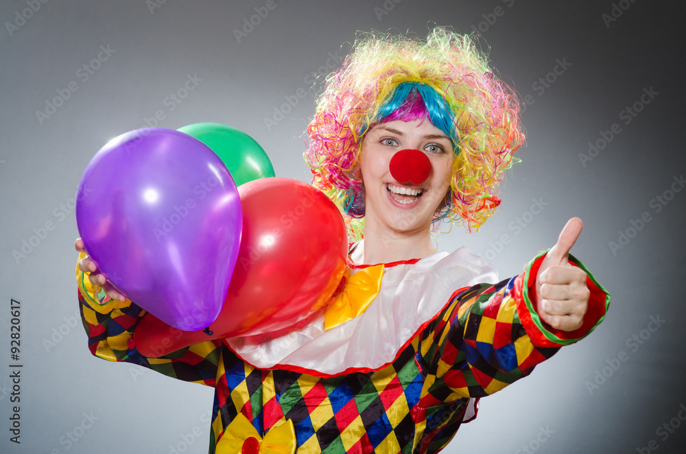 Funny clown in comical concept Funny clown in comical concept