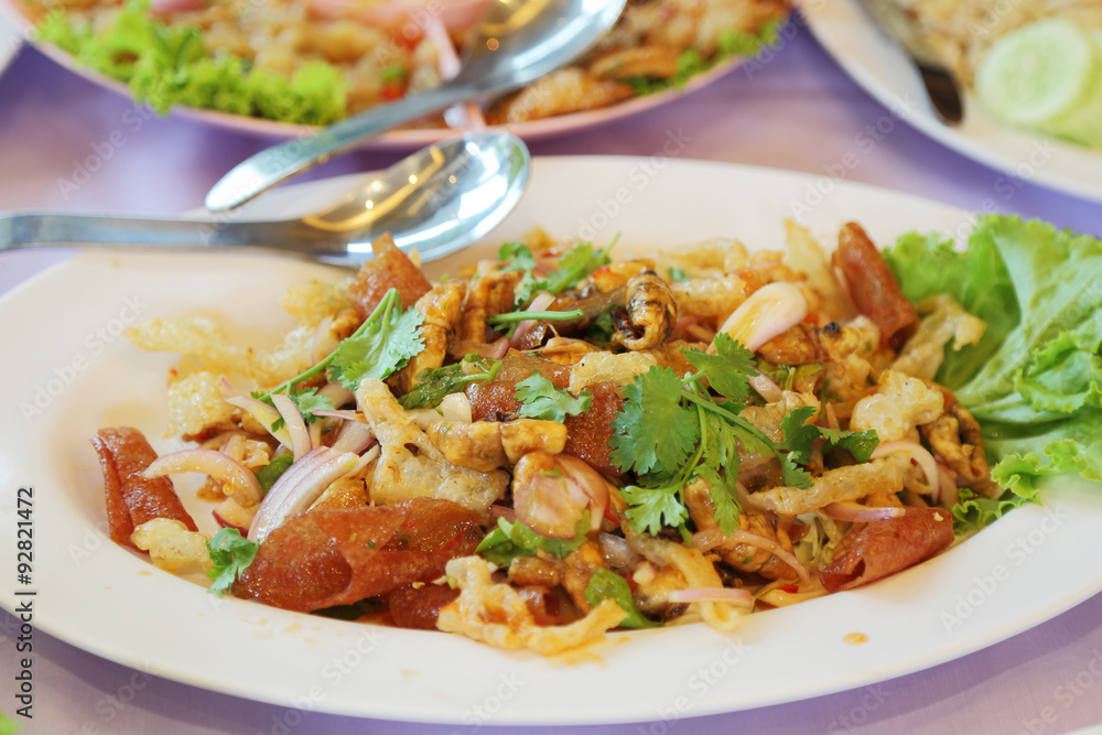 close up of crispy pork mixed with spicy salad (Yam Sam Krob), t close up of crispy pork mixed with spicy salad (Yam Sam Krob), t