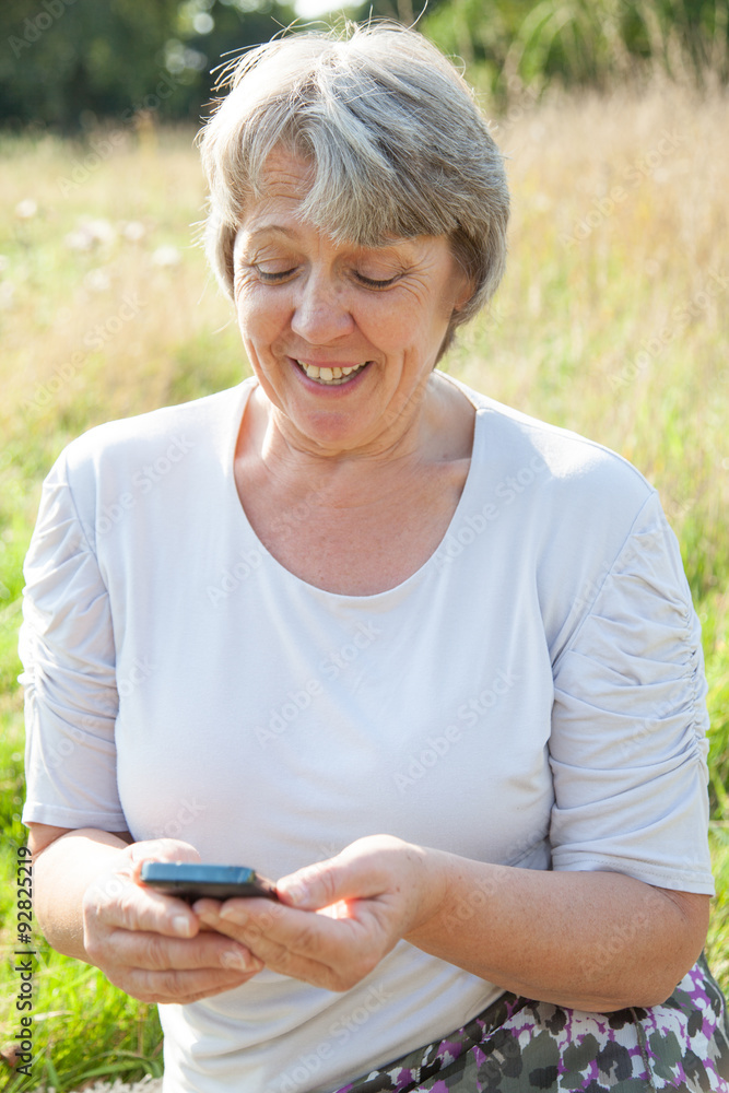 Old age woman using smart phone Old age woman using smart phone
