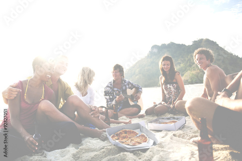 Group of friends having a summer beach party Concept