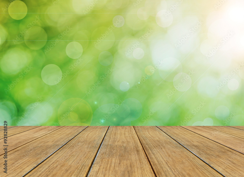 Bright spring with circular bokeh background and wooden floor Bright spring with circular bokeh background and wooden floor