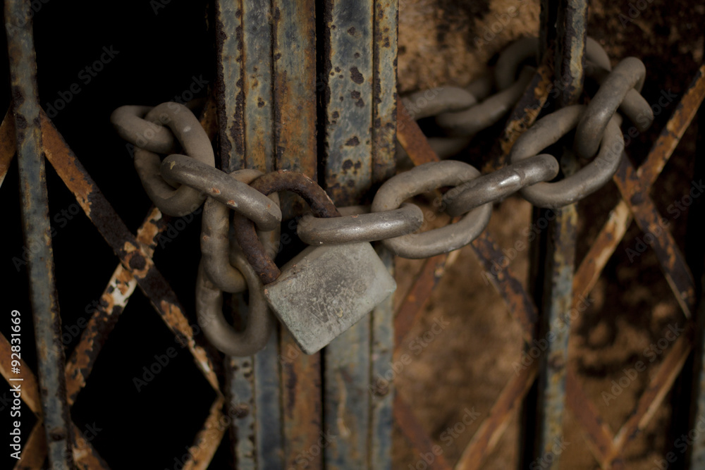 Rusty, iron, ruined padlock and chain Rusty, iron, ruined padlock and chain