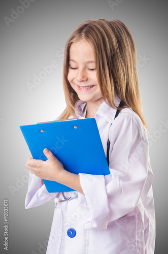 Little girl in doctor costume