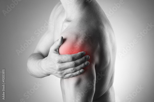 Foto Man with pain in shoulder. Pain in the human body