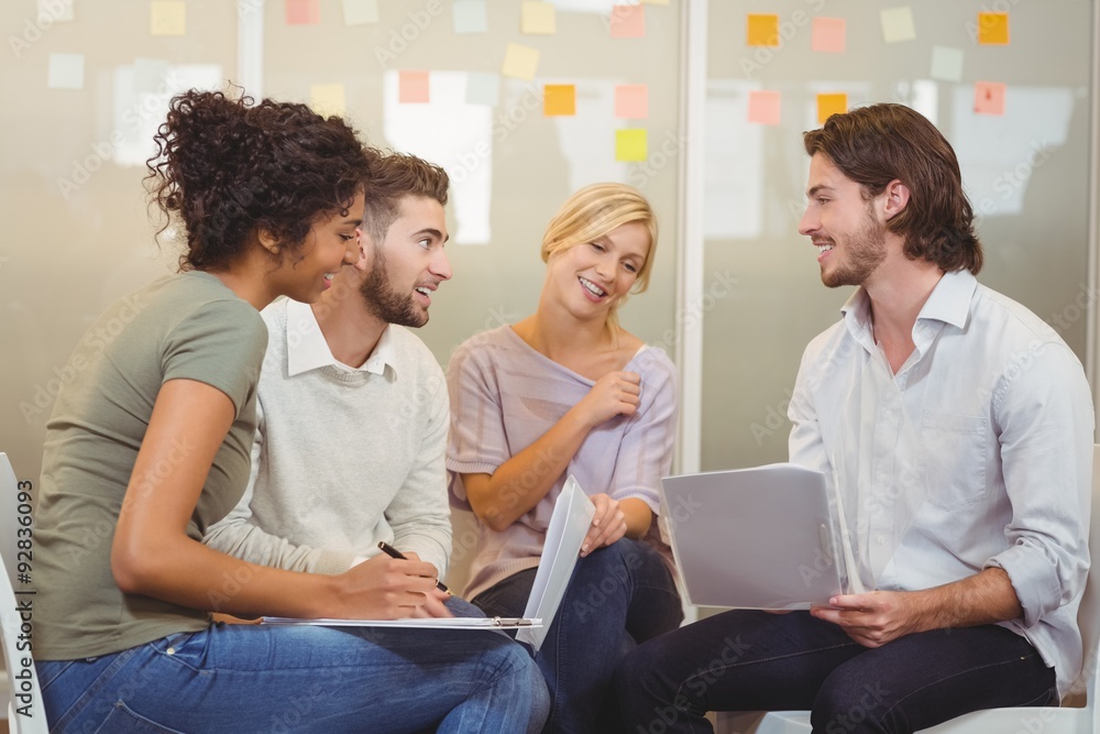 Fototapeta premium Colleagues looking at businessman