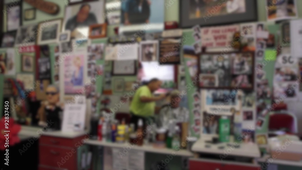 Man getting haircut at barbershop Man getting haircut at barbershop