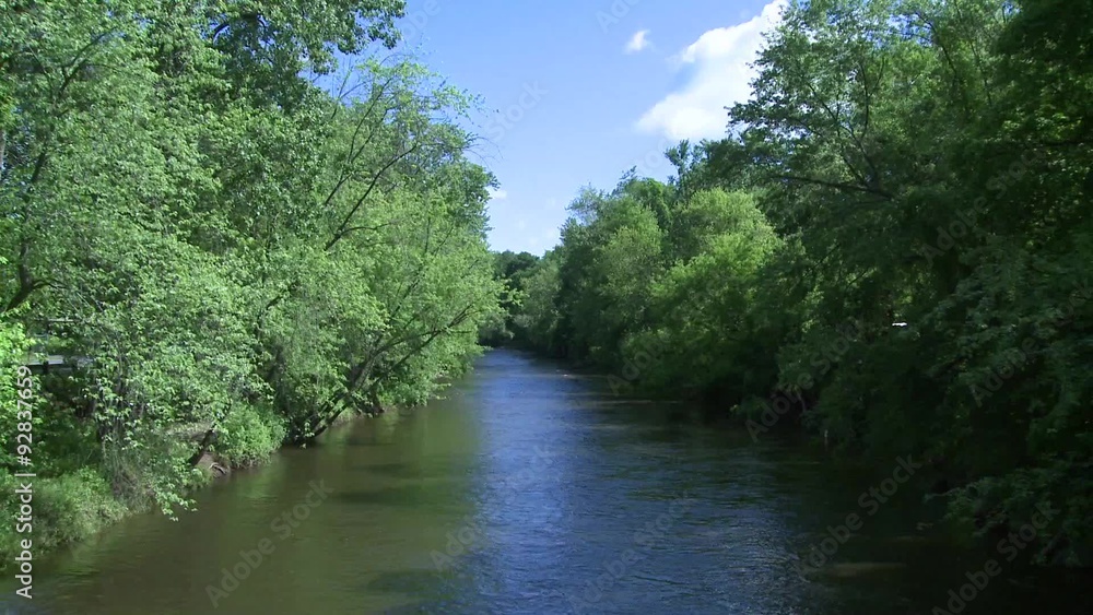 Beautiful river running through the greenery Beautiful river running through the greenery