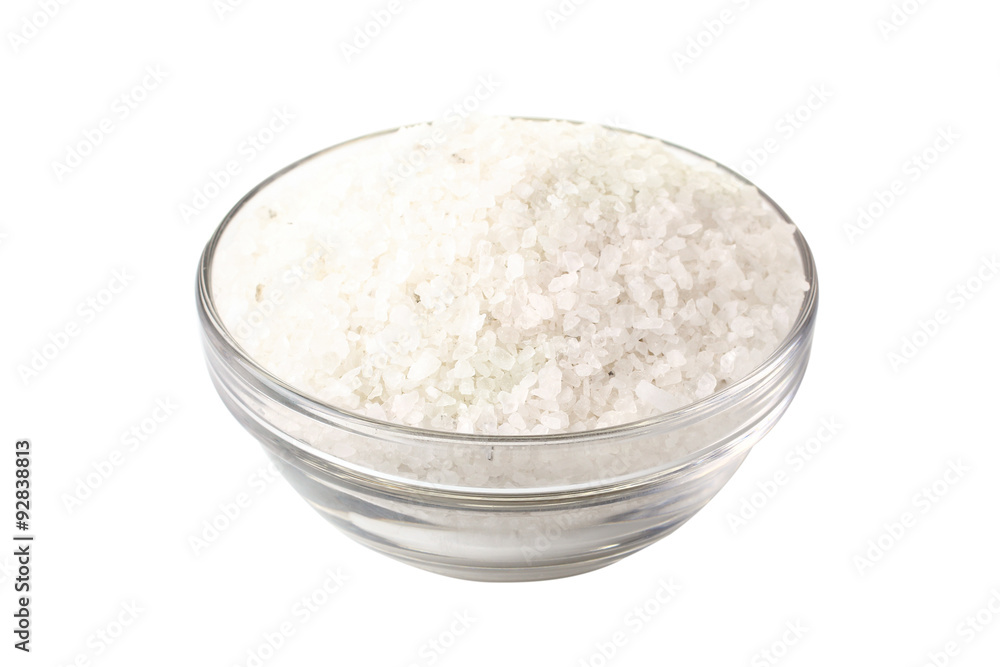 sea salt in a bowl on white isolated background