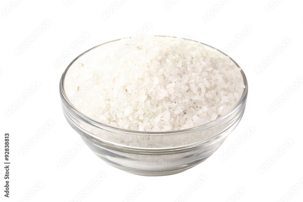 sea salt in a bowl on white isolated background sea salt in a bowl on white isolated background