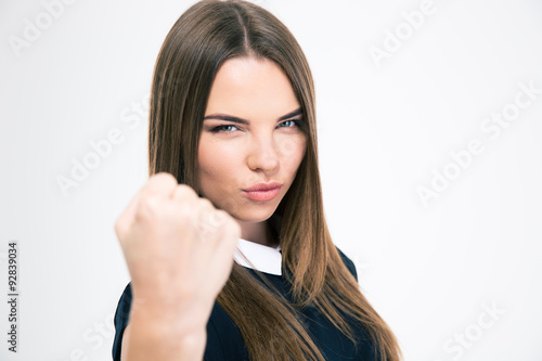 Portrait of a cute woman showing fist