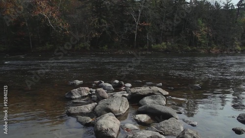 Scenic view of rock-lined river photo