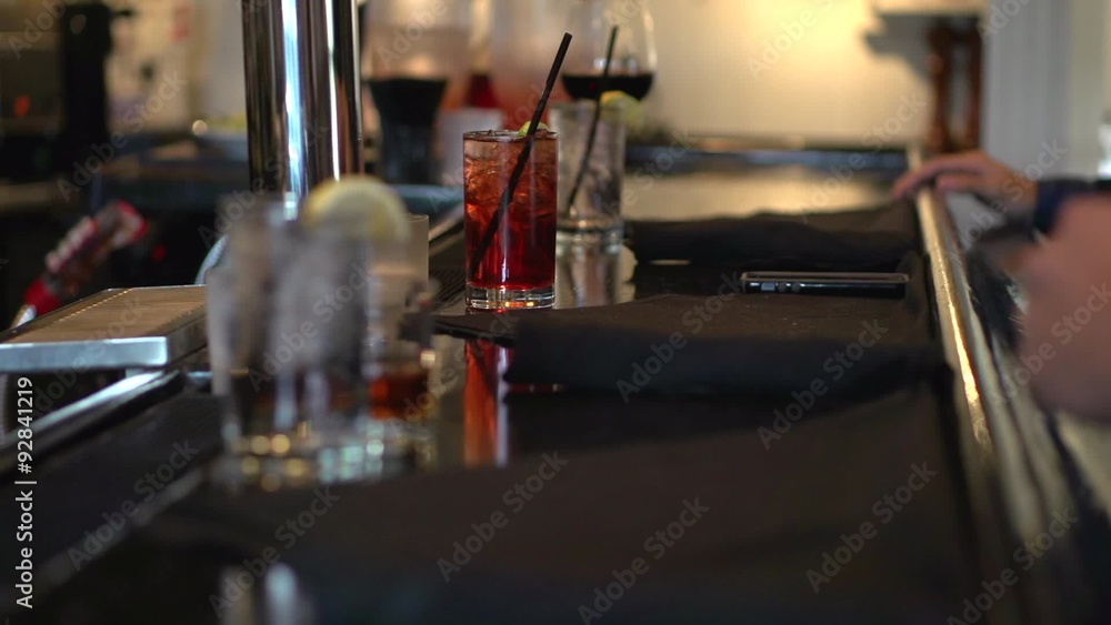 Downing a drink at the Bar Downing a drink at the Bar