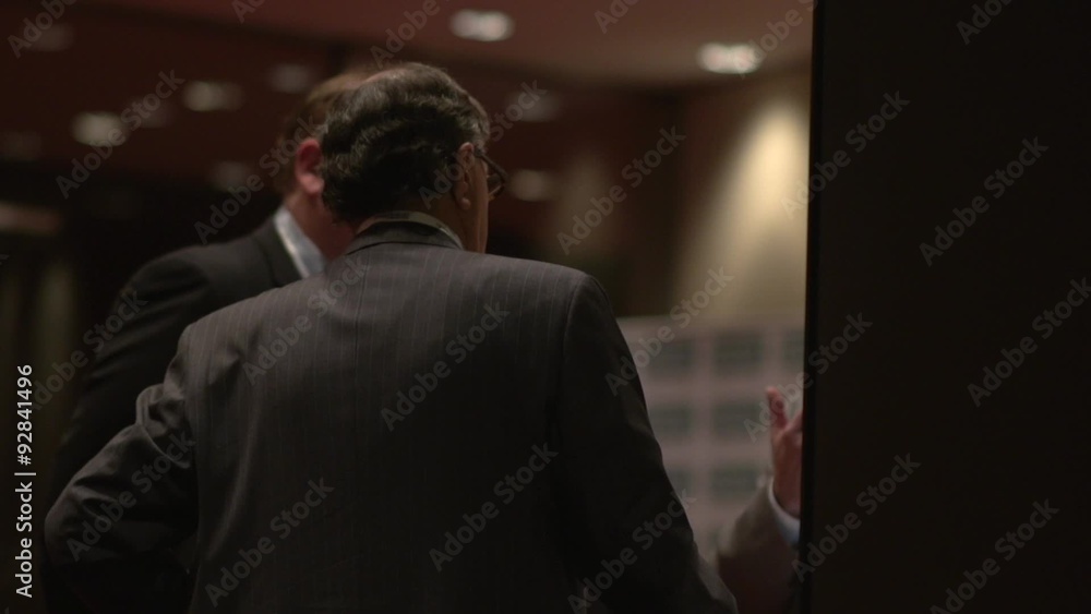Back view of businessmen talking Back view of businessmen talking