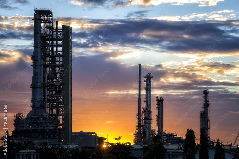 Silhouette of petrochemical industrial plant in sunrise
