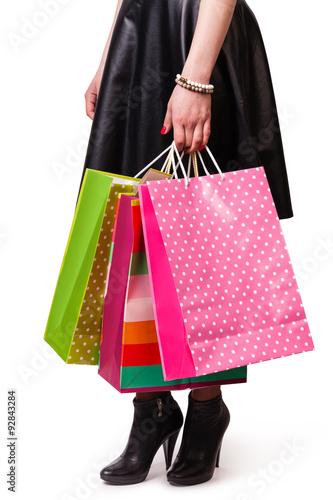 woman holds bag
