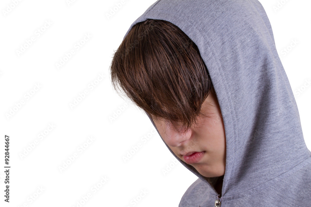 Young man portrait in hooded sweatshirt / jumper being photographed in a studio. Isolated on white background Young man portrait in hooded sweatshirt / jumper being photographed in a studio. Isolated on white background