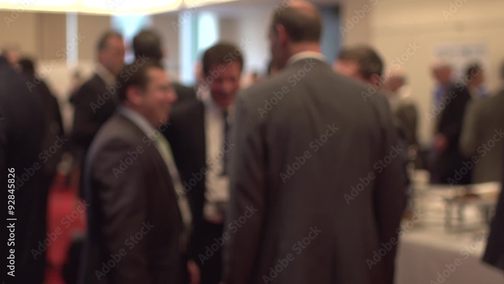 Back view of businessmen talking - slow motion Back view of businessmen talking - slow motion