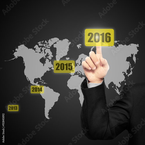 Business person touching 2016 year button