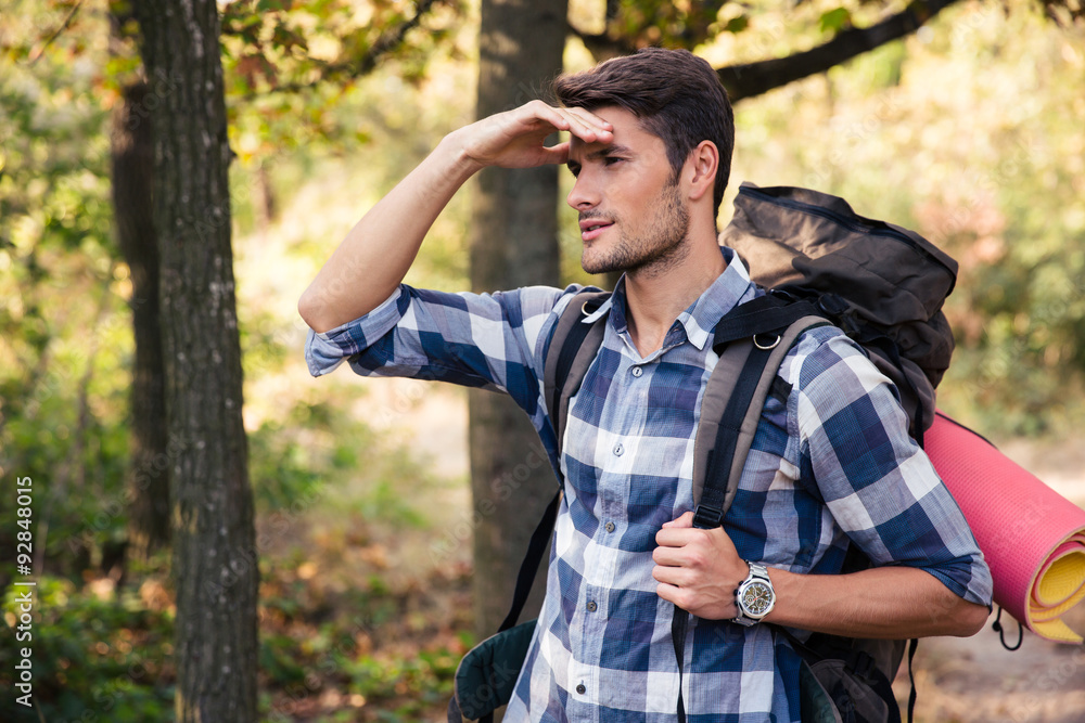 Portrait of a man with marching backpack