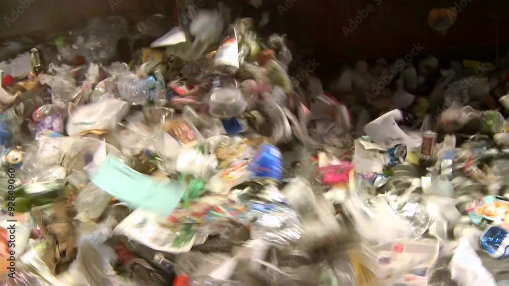Trash on a wheel conveyor Trash on a wheel conveyor