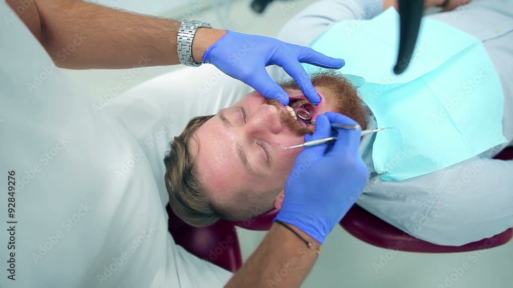 A young guy on dental checkup A young guy on dental checkup