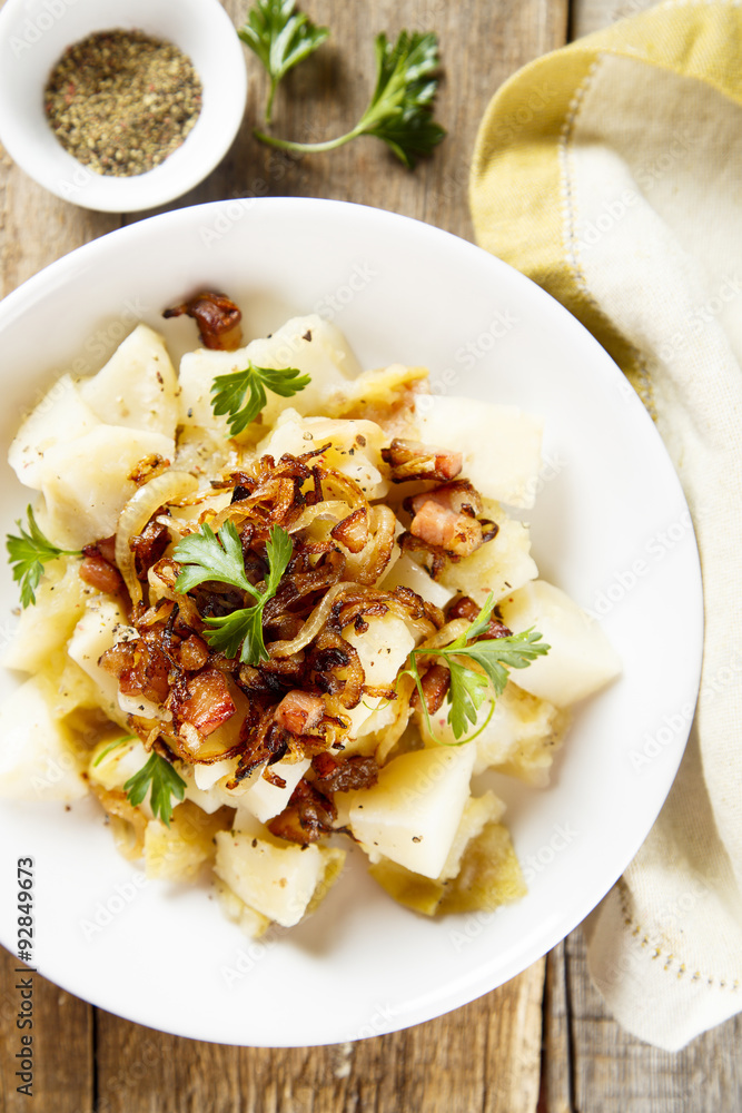 Potato salad with apples, fried onion and ham Potato salad with apples, fried onion and ham