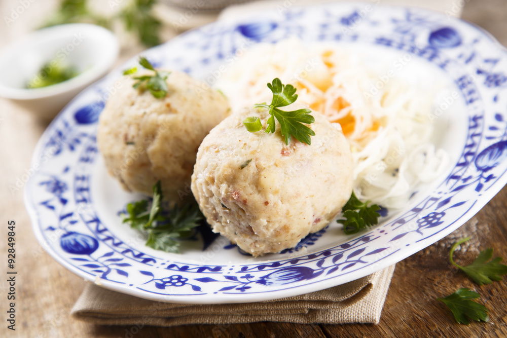Ham and herbs dumplings with sauerkraut Ham and herbs dumplings with sauerkraut