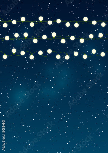 Christmas lights on night sky background 