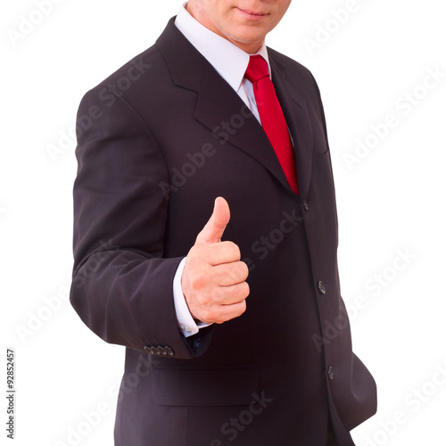 businessman holding thumbs up