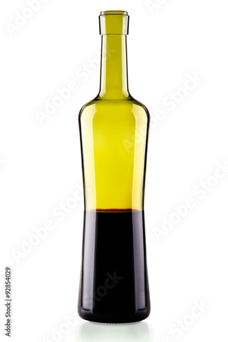Elegant bottle of red wine isolated