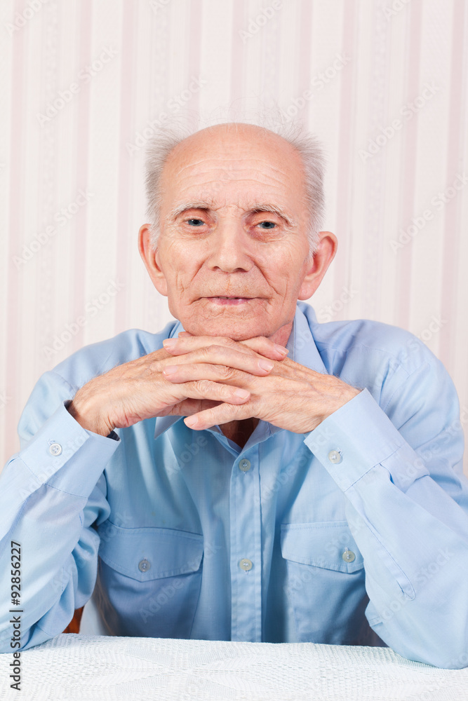 Portrait of senior man thinking about something at home Portrait of senior man thinking about something at home
