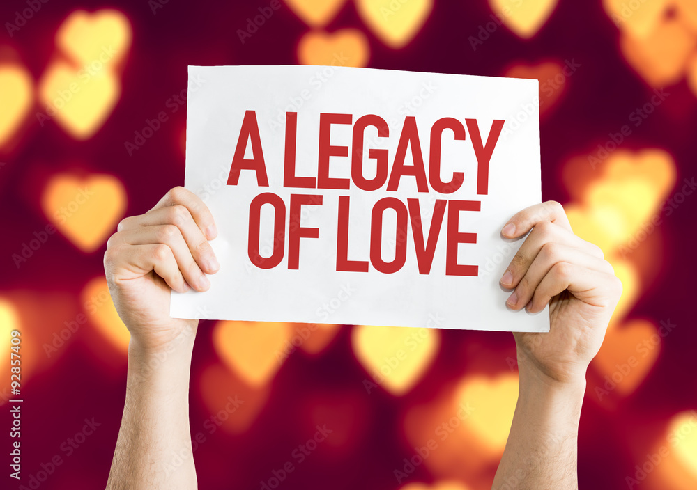 A Legacy of Love placard with heart bokeh background A Legacy of Love placard with heart bokeh background